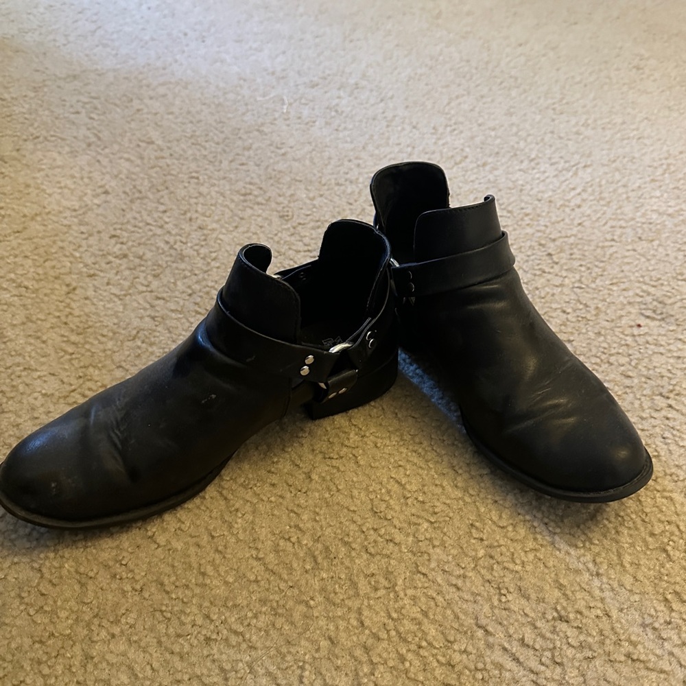 Black booties with cut outs